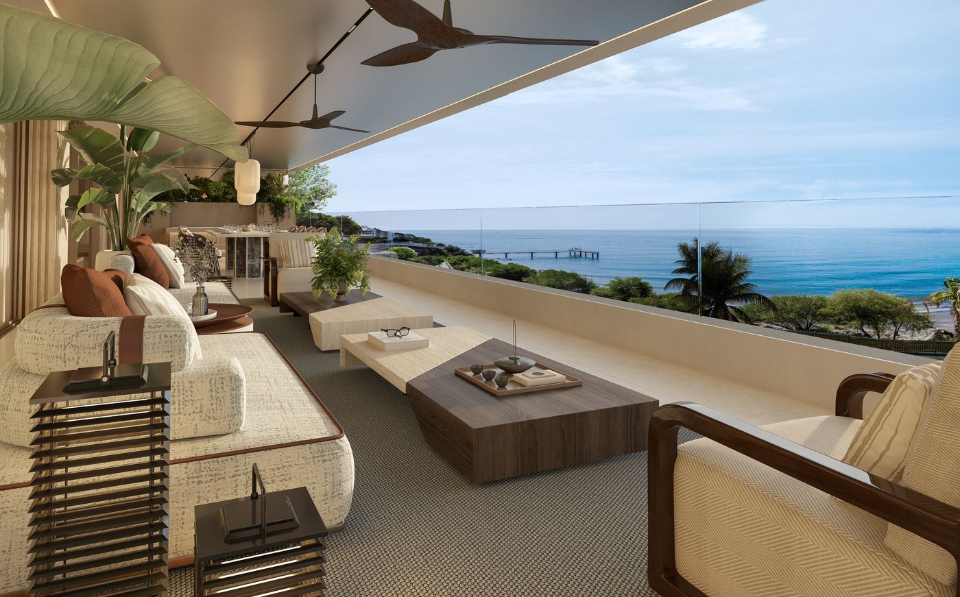 A covered terrace looking out to sea