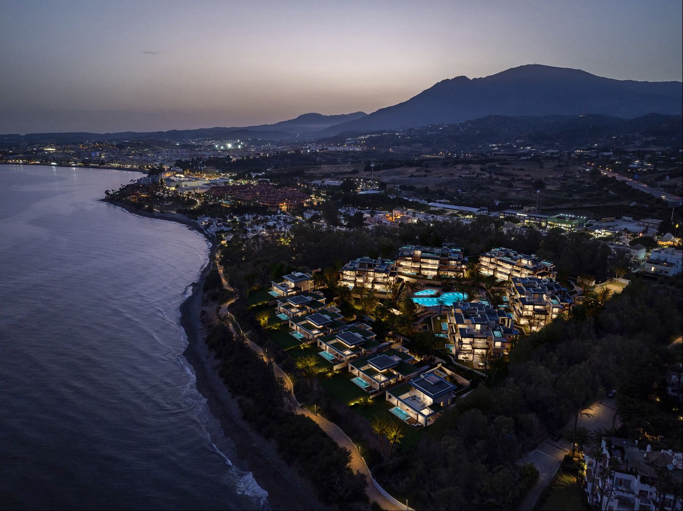 The resort on the beach at dusk