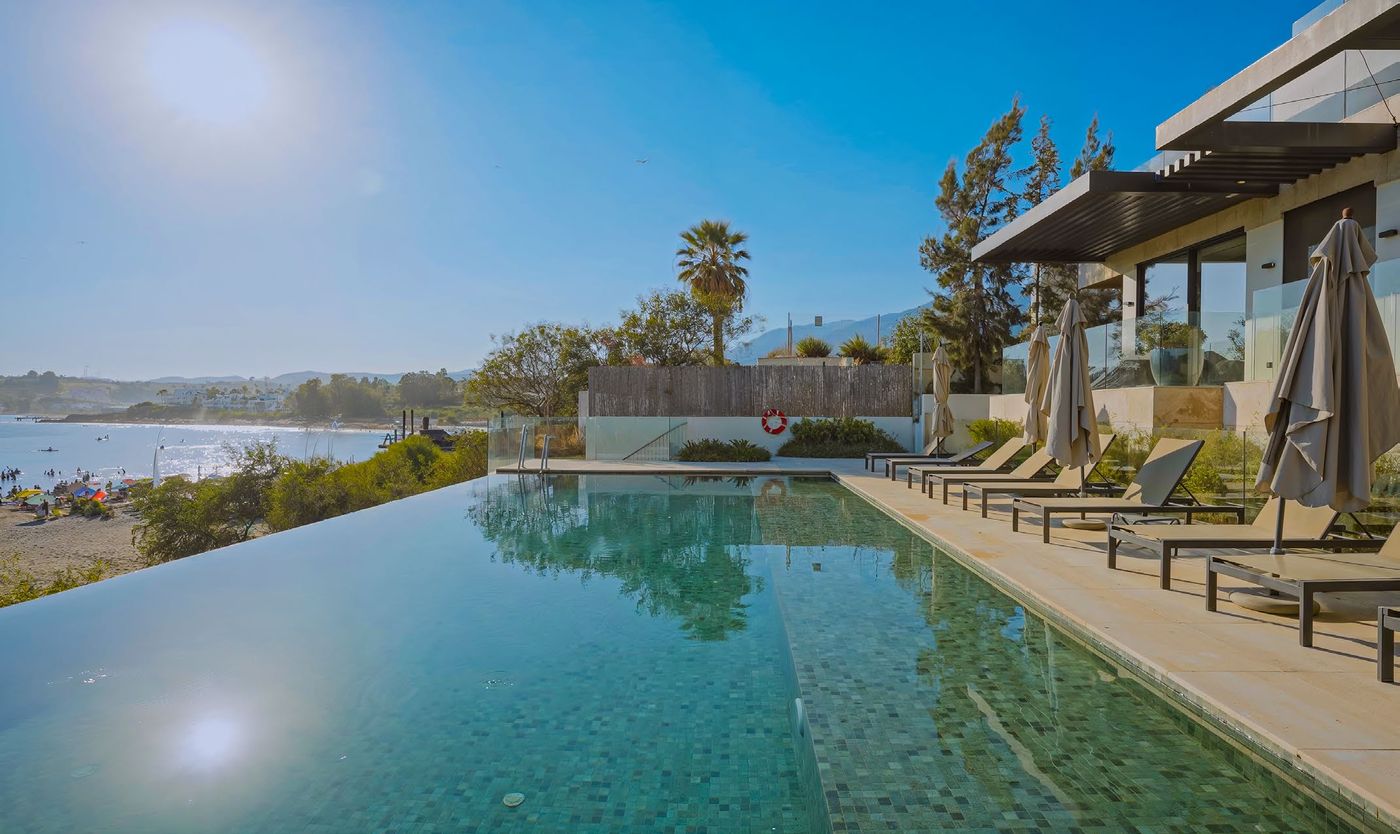 The infinity pool by the marina, looking out to sea